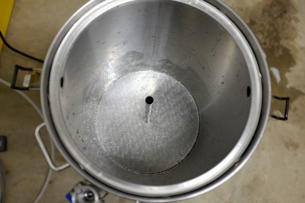 Overflow pipe installed in all grain brewing system